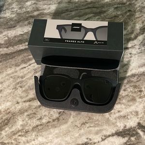 Bose Frames Alto size M/L Sunglasses with Bluetooth speakers built in.